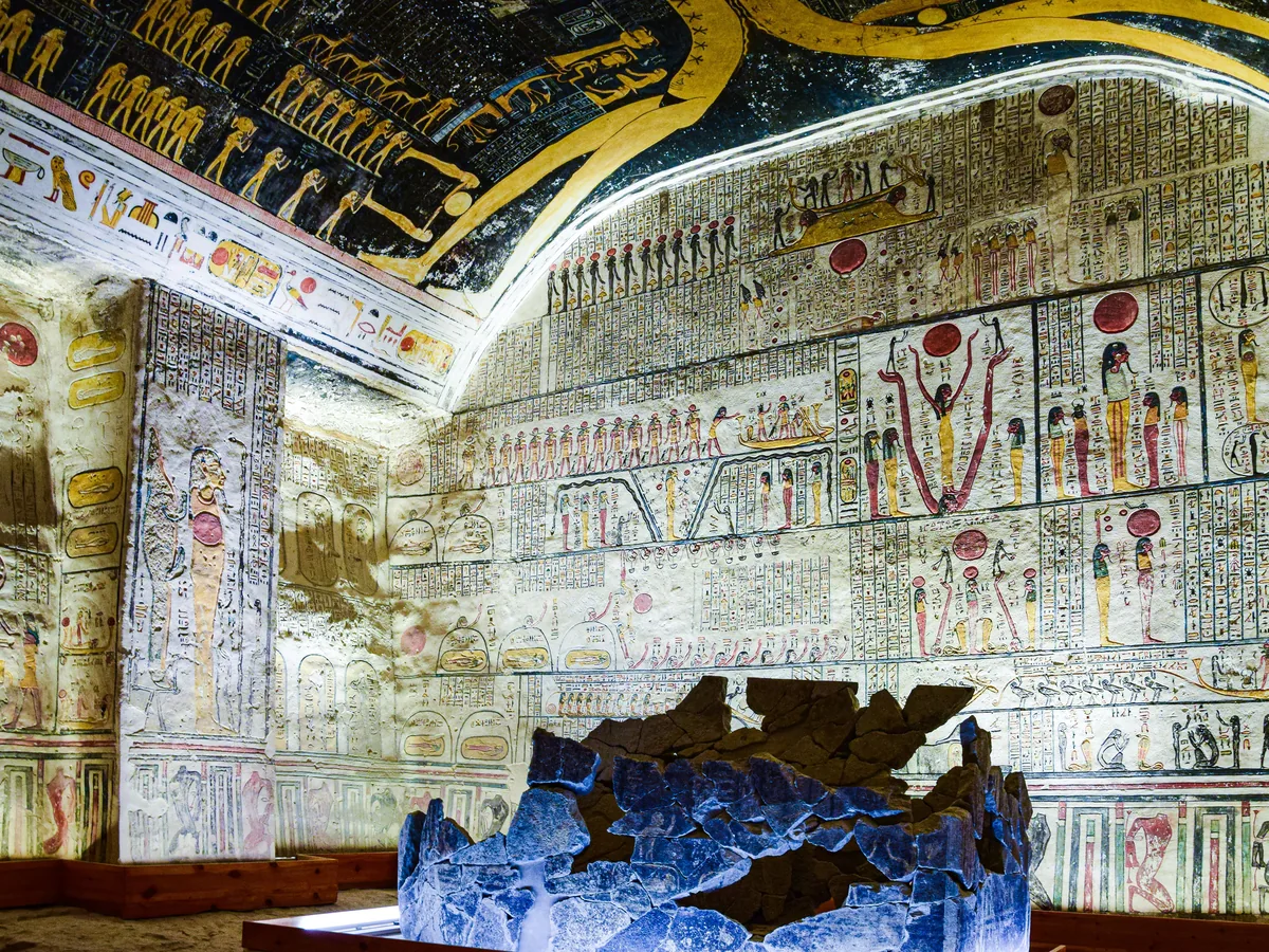 Painted hieroglyphics and frescoes inside a tomb in the Valley of the Kings